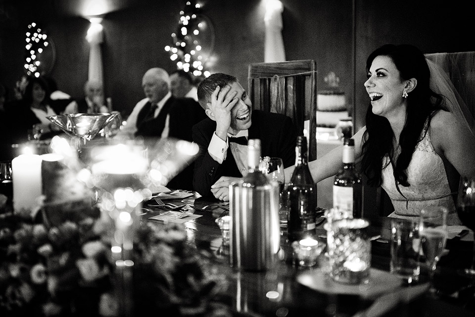 Bride and groom laughing